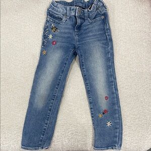 Embroidered Blue Jeans with Insect and Flower Designs